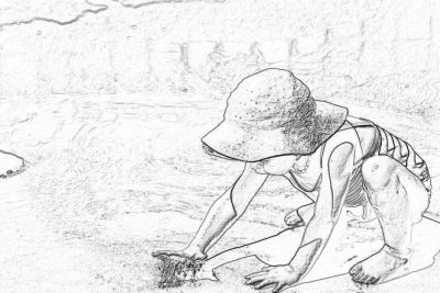 Black and white line drawing of young boy wearing sun hat playing in the sand at beach, making model with small rocks. Pencil sketch.