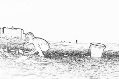 Black and white storyboard line drawing of a child playing in the sand on the seafront at Southend, there is an empty bucket next to them. The drawing is in the style of appeal.