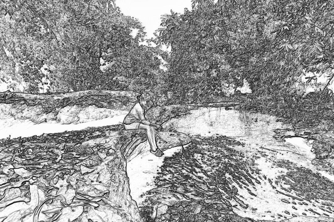 Black and white storyboard sketch of man sitting on rock fishing in stream, trees and rocks surrounding the scene, white background, high angle shot, wide lens