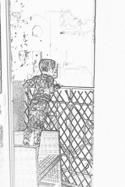 A little boy wearing camouflage is climbing on the balcony fence, with an empty wall in front of him and some boxes next to it. The drawing style adopts simple lines and black white tones. He uses crayons or markers to draw details. High angle perspective, focusing on children's expressions and movements. It has the style of a coloring book page, with pencil art in the style of Zack.