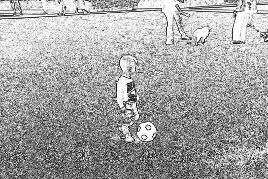 A little boy playing soccer on the field, with his family watching from afar. Black and white sketch, storyboard style. The child is wearing an oversized jersey that was taken off by one of them to play football in it. A dog stands next to him waiting for its ball. On both sides there were other people walking around or sitting down on their knees, enjoying the game. They all looked happy as they played together in the style of one of them.