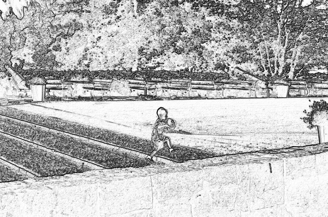 Black and white storyboard line rough sketch, simple pencil drawing of a child playing in the park near an empty football stadium with trees behind it. The kid is holding his toy while running on one side of concrete steps leading to a grass field in the style of.