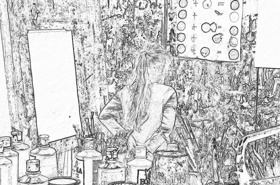 Black and white line drawing of an artist’s studio with paintbrushes, tubes of oil paints, canvas cluttered on the wall behind her. She is sitting at a desk surrounded by various scientific equipment such as test tube vials and beakers. The room has elements of both art and science, creating a creative atmosphere. Her hair was long and straight in a messy bun. It’s a simple sketch without any shading or color, focusing solely on lines to capture details and depth. in the style of v5.2