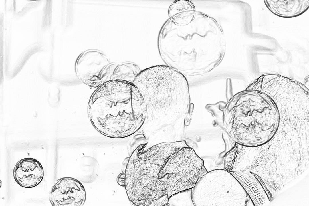 Black and white pencil sketch storyboard of children playing with soap bubbles, closeup shot. The background is an indoor setting filled with bubble machines and bubbles floating in the air. The focus should be on capturing intricate details such as textures of fabrics and facial expressions. Drawn in the style of [Greg Rutkowski](https://goo.gl/search?artist%20Greg%20Rutkowski).