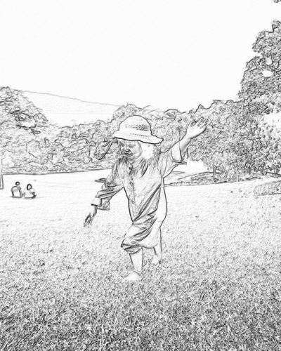 A little girl dressed as an Asian farmer is playing on the lawn, her arms outstretched and hands raised in joy. The background features green grass with trees, creating a natural landscape. Done in a black and white pencil sketch style. A simple drawing technique captures details of textures like fabric or skin. It's a joyful moment captured in a full body shot. There could be other children nearby, adding to the lively atmosphere.