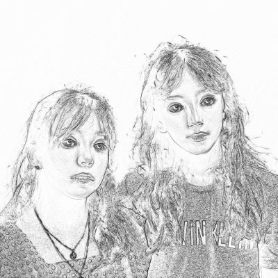 A simple sketch of two girls, one with long hair and the other short, both wearing t-shirts that say "North Cliffthe only school in Northy fusion club". The drawing is done entirely by hand using pencil, creating an artistic feel on white paper. It's in a black and white style, with no color, giving it a vintage look.