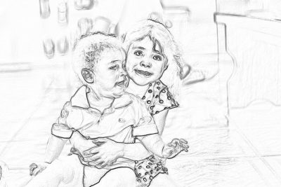 A black and white pencil sketch of an African American little boy with short hair, wearing shorts and a t-shirt sitting on the lap of his blonde Caucasian big sister in her dress. They are holding each other and smiling happily at each other. The background is blurry to focus attention on them.