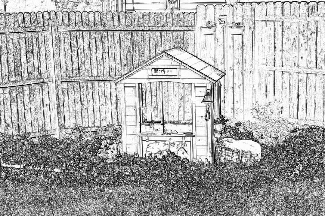 Black and white pencil sketch of an outdoor playhouse in the backyard with a wooden fence, garden and flower bed. The children’s house has windows and doors decorated in the style of hand drawn graffiti. In front there is a small well and stone table for playing board games or drinking water on hot days. No people are visible. Sketch style.