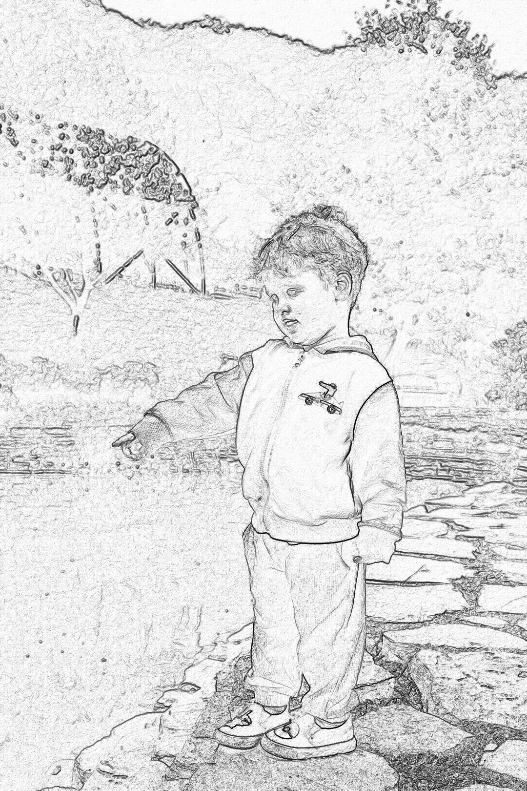 A simple sketch of an adorable little boy in pajamas and sneakers, standing on the edge of a stone path by a river or lake with trees in background. He is reaching out to touch water with his hand. The drawing should be simple line art with white lines against black backgrounds, suitable for coloring pages. It captures the innocence and curiosity of childhood.