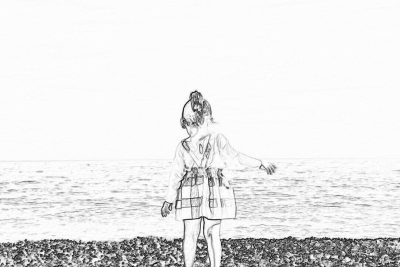 Black and white pencil sketch of an adult girl standing on the beach, wearing a plaid jacket, holding her hands out to her sides as if reaching for something in front or behind her. The background is a wide view of the sea with calm waves. There is no text. In the style of a minimalist line drawing.