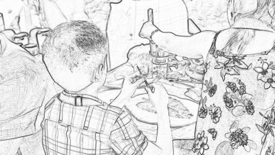 A black and white storyboard sketch of an open air family picnic in the garden, showing friends laughing around table with decorations of wildflowers and vases full of wine glasses. A young boy is sitting at one end eating chicken wings. The camera captures him from behind as he reaches for his expressionless face covered by short hair that hides half her head. He has just put on sunglasses over it. It's sunny outside. The focus should be on their faces,