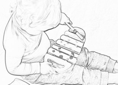 Black and white line drawing, baby playing with toy Xylophone on his lap.