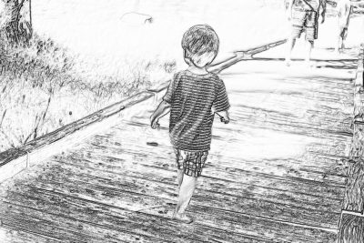 Black and white pencil sketch of an adorable little boy walking on the boardwalk at a beach, back view, drawn in the style of a children's book.