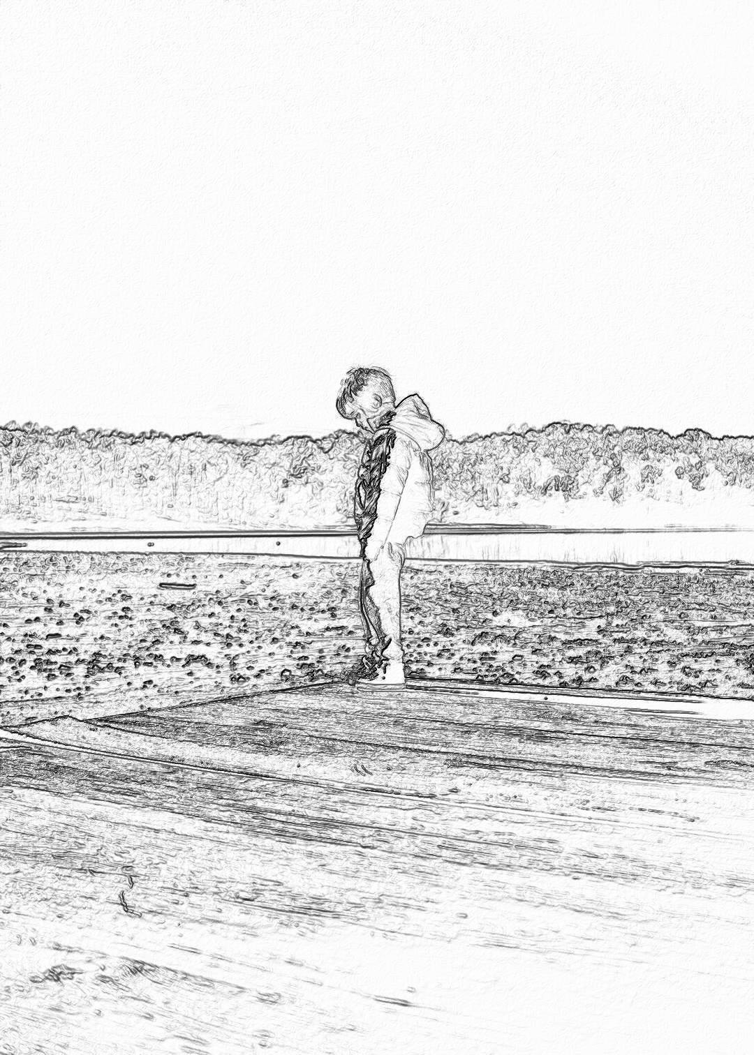 a little boy standing on the beach, holding his shirt up to show it off. The view is from behind him and he’s looking at me. He has short hair. Black ink drawing on white background.