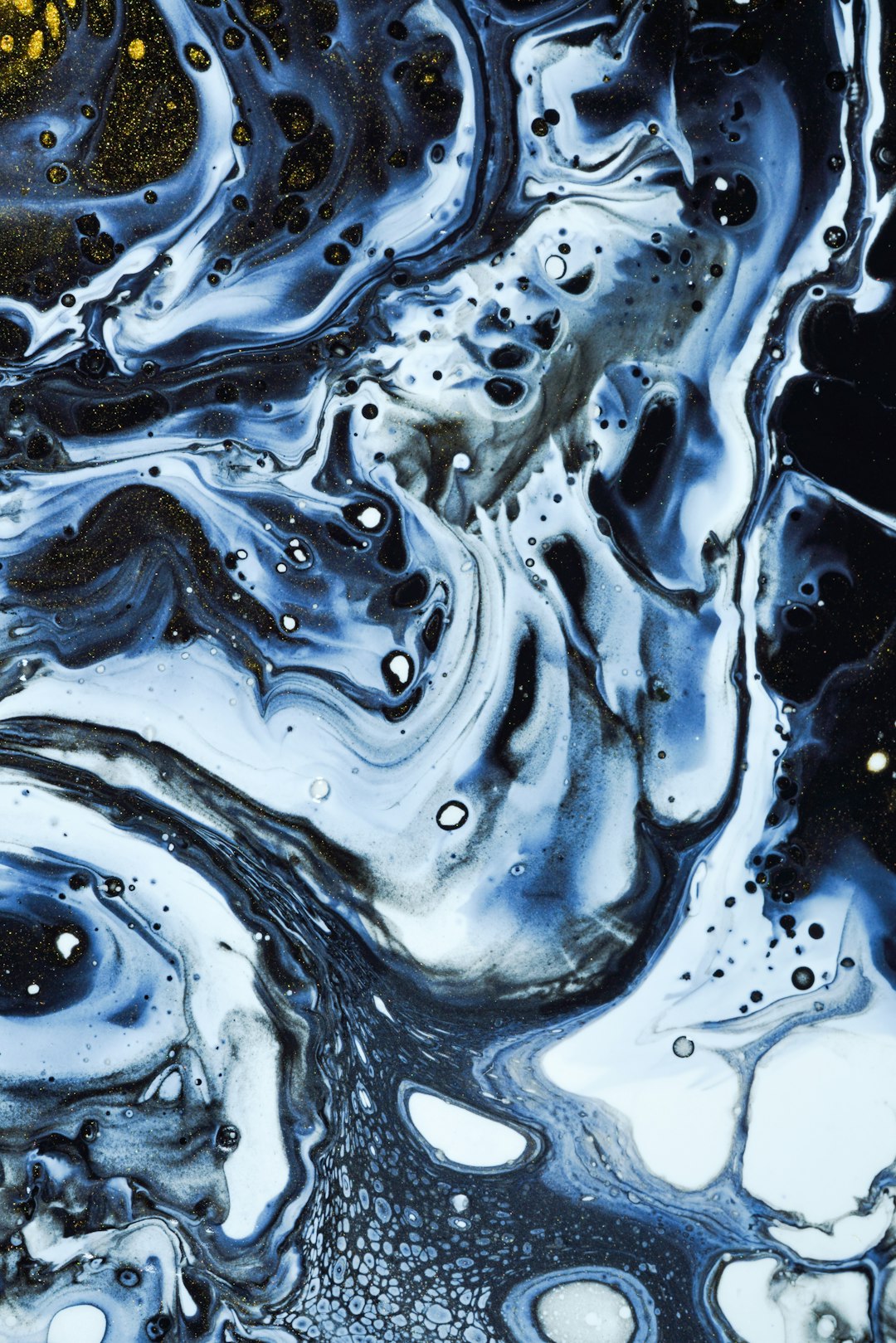 Black and white swirls in blue, acrylic fluid art depicting the closeup of the universe in the style of white dots with gold on a black background, creating an abstract painting style. The overall color scheme is mainly dark tones, creating a mysterious atmosphere. High definition photography. –ar 85:128