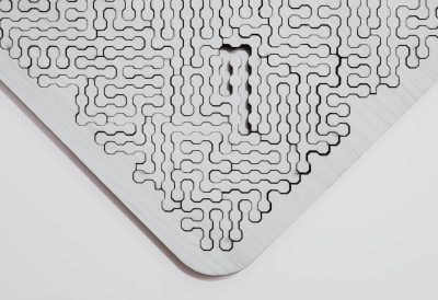 A laser cut, flat white metal, triangular puzzle with intricate interlocking pieces. The design is made of simple black lines on the surface. There's an empty space in one corner for the viewer to place their hand or body into and feel what it would be like if they were inside such a complex maze. It could evoke feelings of confusion or wandering when placed over top of another object. This image was created in the style of C destroyer using Adobe Illustrator and digital drawing software. --ar 128:87