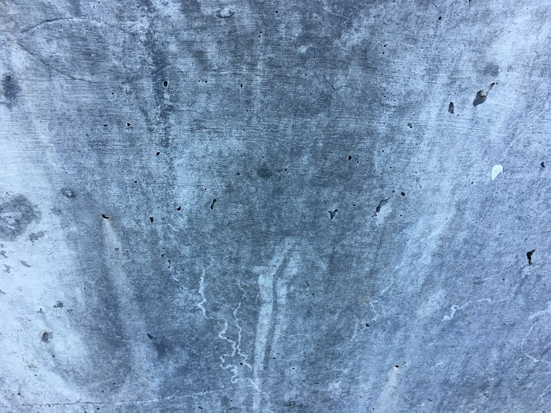 flat concrete texture, blue-grey, dirty and worn, dust marks in the style of an old surface. –ar 4:3