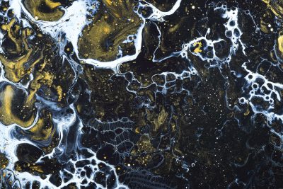 Abstract black and gold marble pattern, fluid art background with swirling patterns of white and yellow on dark blue surface --ar 128:85