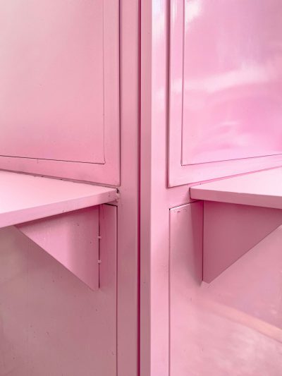 Close up shot of pink metal cabinets in a pastel aesthetic style, hyper realistic photographic style. --ar 3:4