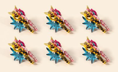 6 pieces of Chinese style dragon shaped candy toys, made from colorful plastic material with star patterns on the body and wings, symmetrical composition, white background, studio lighting, product photography, shot by Sony A7c camera, Meike50mm F/2.8 lens --ar 64:39