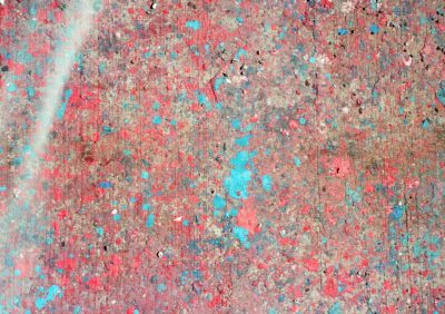 The flat texture of paint splattered on concrete, in red and blue colors. --ar 64:45