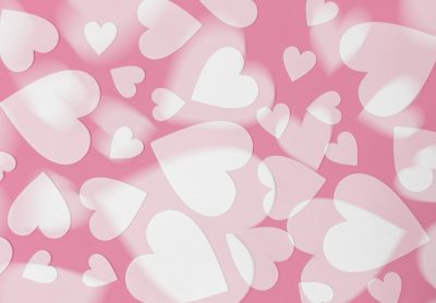 Pink background with white hearts, in the style of pink. --ar 16:11