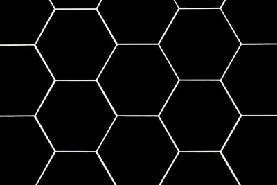 A seamless hexagon pattern, white outline on black background, simple and elegant design for a tile effect in the style of M.C., perfect for various applications where symmetrical geometric patterns can be used --ar 128:85