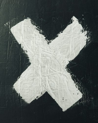 White X painted on black background, texture of the paper, simple and minimalistic, white x symbol, closeup, high resolution. The painting was done in the style of White X with a simple symbol on a textured black background. --ar 51:64