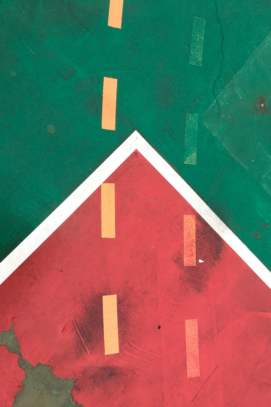 Top view of a red and green basketball court in the style of minimalism, with paint texture details, in a photo realistic close up flat lay shot, in the style of David Burell. –ar 85:128