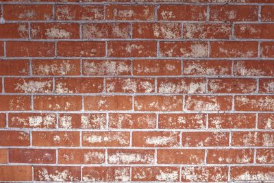 Red brick wall background with white paint texture, --ar 128:85