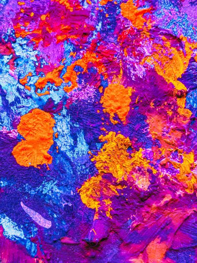 Abstract painting of vibrant purple, blue and orange paint splashes, with intricate patterns resembling natural elements like leaves or flowers. The colors create an artistic background that would be great for design projects related to nature, artistry, creativity, or color contrast. It could also make an eyecatching element in digital marketing materials. --ar 3:4