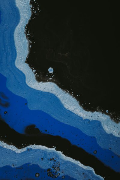 Black background, blue paint flowing down the center of it in large waves. The paint is mixed with white and gray. There's some black oil spilt on top of that paint. Minimalist aesthetic. --ar 85:128