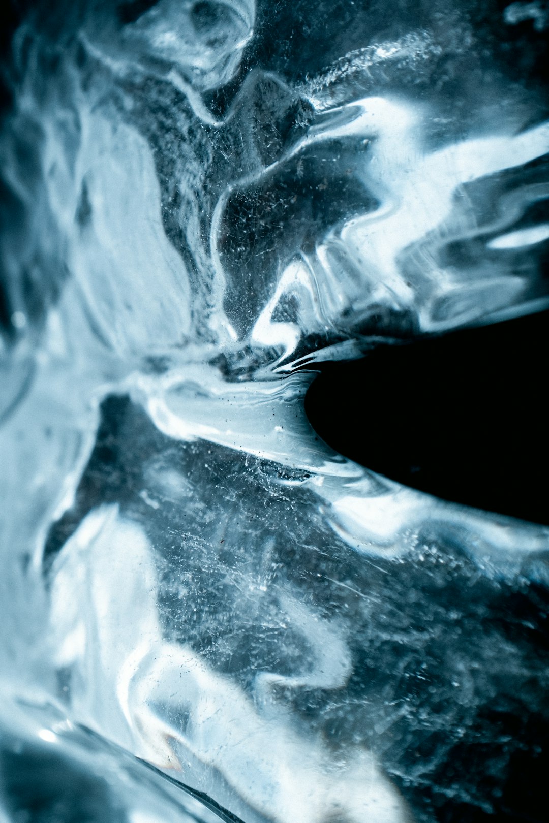 close up of ice, ice blue, closeup, macro photography, black background, abstract –ar 85:128