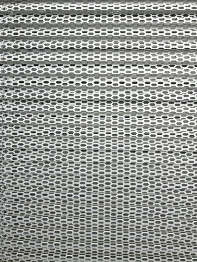 a close up of the texture of an aluminum mesh screen, flat gray background, white grid pattern, front view, symmetrical, studio photography, high resolution --ar 3:4