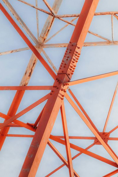 orange steel structure, close up shot of tower truss details, architectural photography, architecture photography in the style of architecture photography --ar 85:128