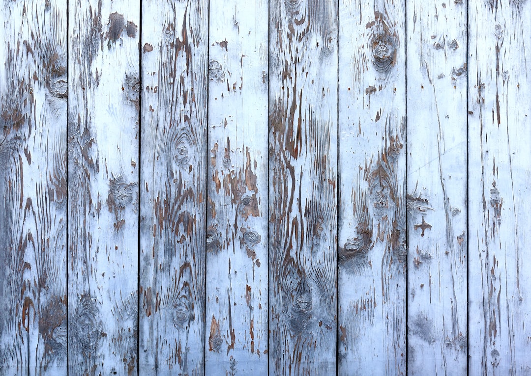 light blue faded paint on white wooden planks, detailed, photo realistic in the style of HD –ar 64:45