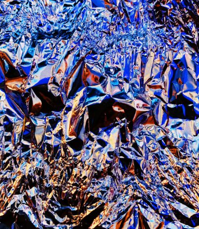 crumpled shiny foil, macro photography, hyper realistic, hyper detailed, dark blue and silver, glitchy effects, houdini simulation in the style of houdini --ar 111:128