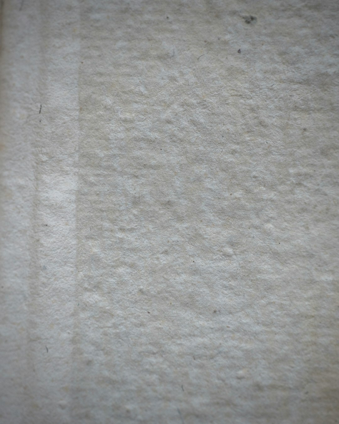 A close up of the texture on an old paper against a light gray background. A slightly worn and aged white blank page in the style of. –ar 51:64