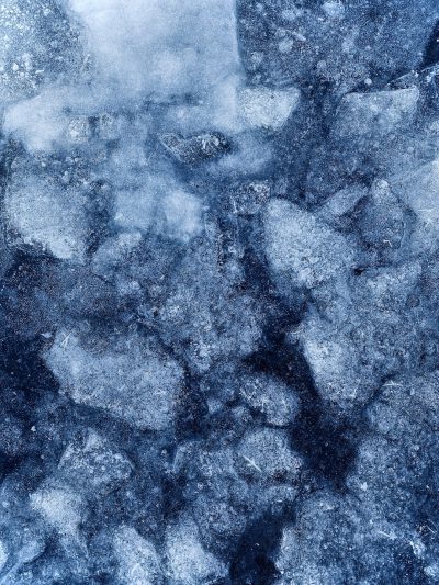 close up of ice, texture, top view, dark blue tones --ar 3:4