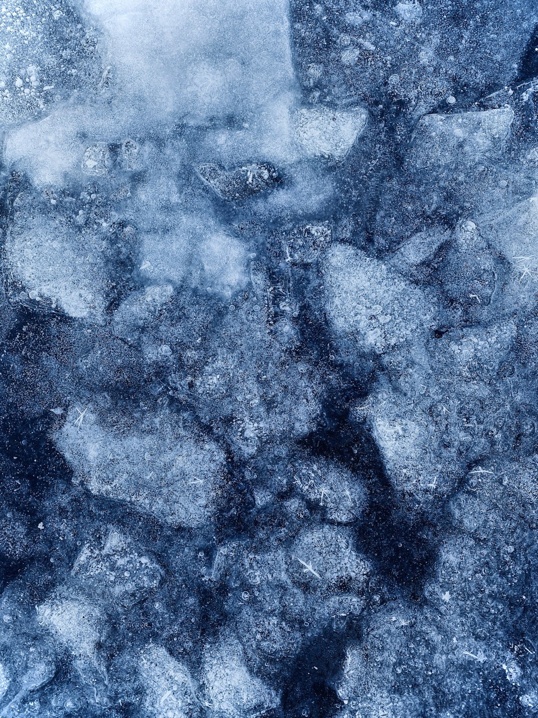 close up of ice, texture, top view, dark blue tones –ar 3:4