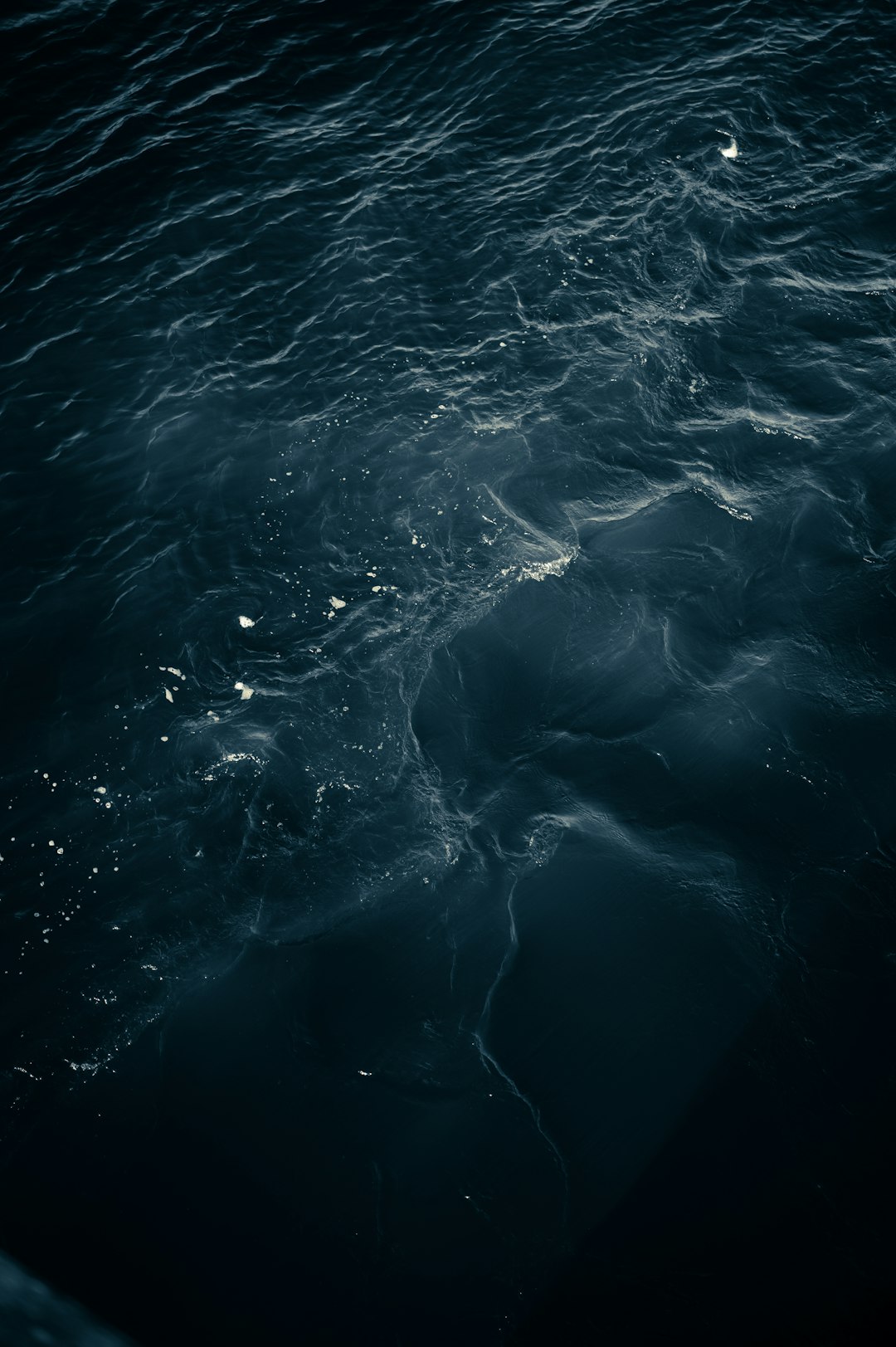 dark water texture, dark ocean water, dark sea, top view, night, photo realistic, cinematic –ar 85:128