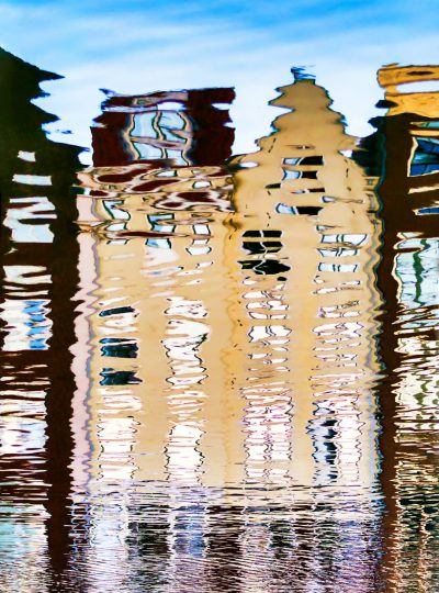 Abstract reflection of Amsterdam's old buildings in the canals, creating an illusionistic pattern on water surface. The reflections create intricate patterns and shapes that add depth to the scene. --ar 47:64