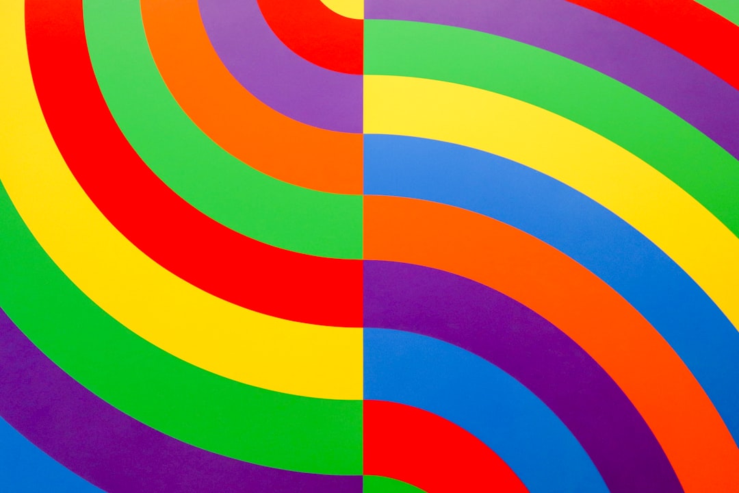 An abstract painting with colorful stripes, in the style of ponyo, featured on flickr, striped background, minimalism, with a purple background, rainbow colors, rainbowcore, rainbow, in the styles of [Victor Vasarely](https://goo.gl/search?artist%20Victor%20Vasarely) and WimmerFries –ar 128:85