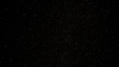 Starry sky, black background, white stars scattered in the air, no other elements on screen, minimalism, high definition photography, hyperrealistic, low angle shot, cinematic light and shadow effects, slow motion, depth of field effect. --ar 16:9