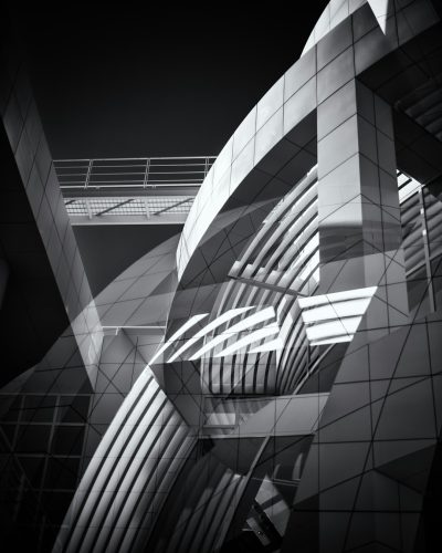 Black and white photography of an abstract geometric architecture from an archdaily photo shoot, with rich details in the style of the photographer. --ar 51:64