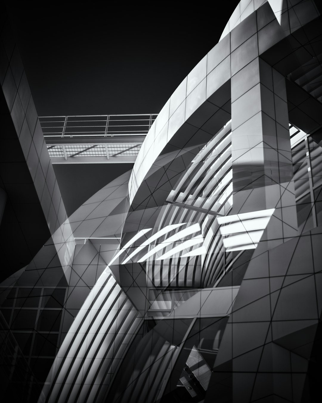 Black and white photography of an abstract geometric architecture from an archdaily photo shoot, with rich details in the style of the photographer. –ar 51:64