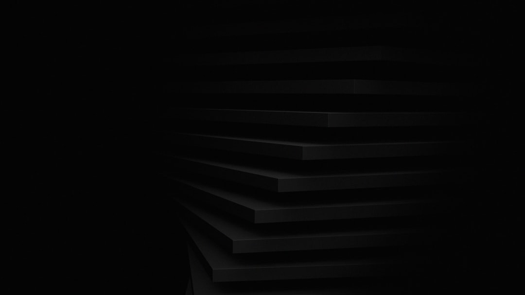 Black background with minimalistic black stairs, dark abstract wallpaper in the style of minimalism. –ar 16:9