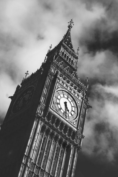 Black and white photo of Big Ben in London, with high contrast and a dark sky. A low angle, close up shot. In the style of [Ansel Adams](https://goo.gl/search?artist%20Ansel%20Adams). --ar 85:128