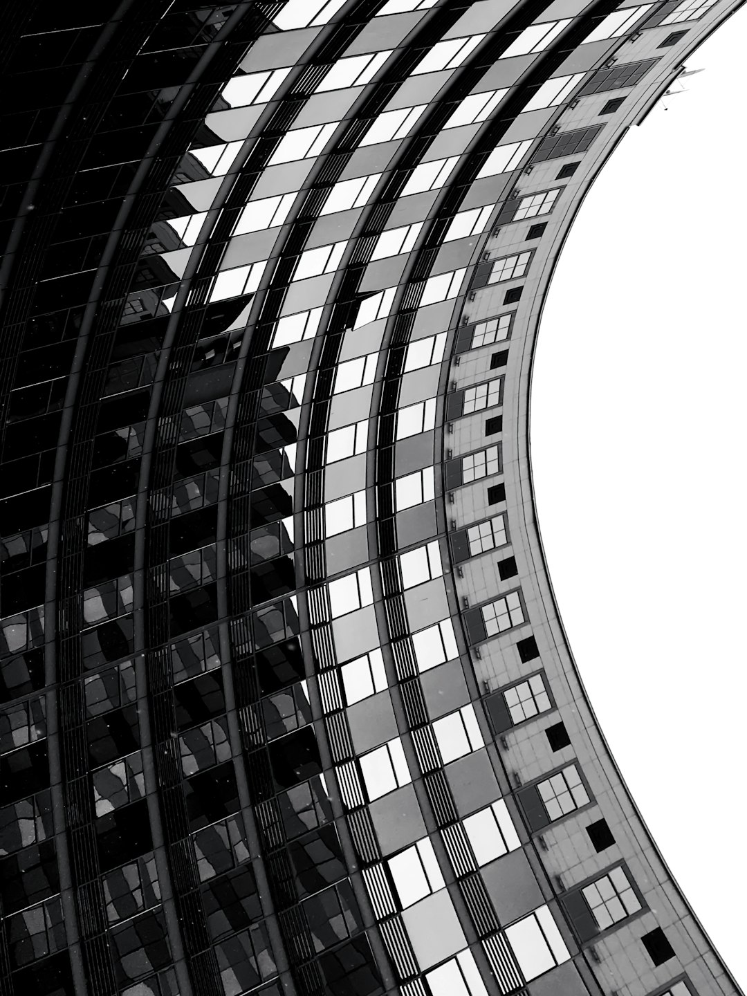 skyscraper, black and white, simple, abstract, curved lines, high detail, high resolution, –ar 3:4