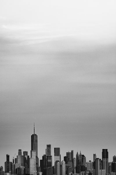 Black and white photo of the New York skyline, gray sky, simple, minimalistic, shot in the style of Leica M3. --ar 85:128